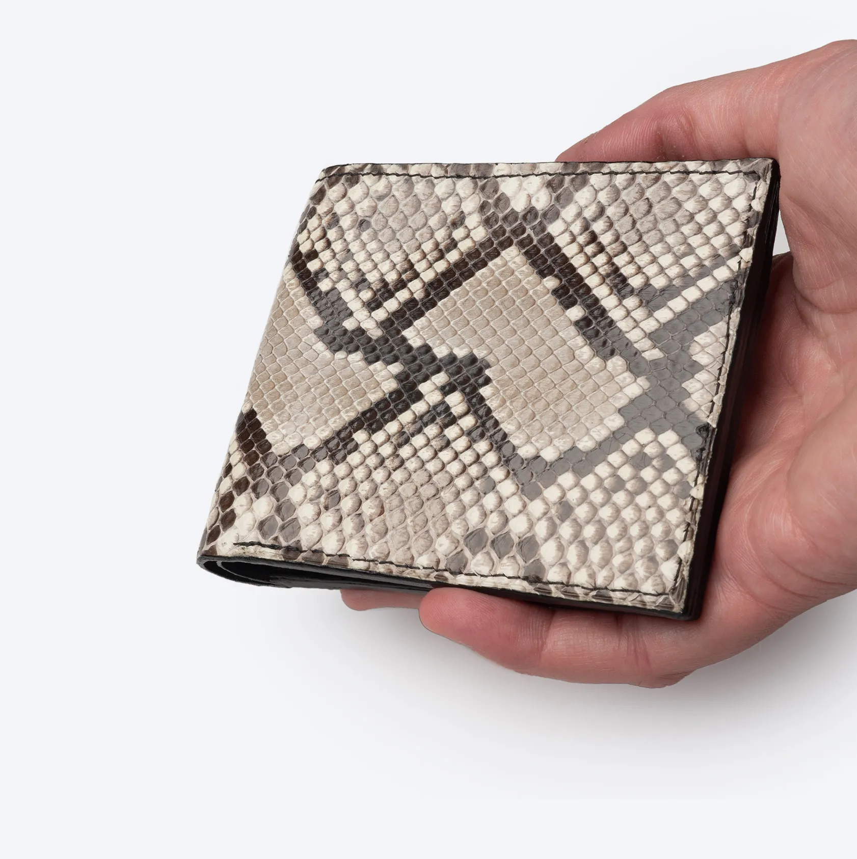 Leather wallet held in hand